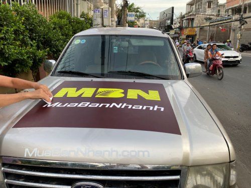 In decal quảng cáo xe ô tô và trên áo công ty MBN
