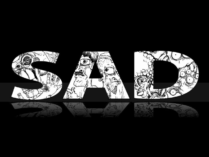 Ảnh avatar màu đen có chữ "sad"