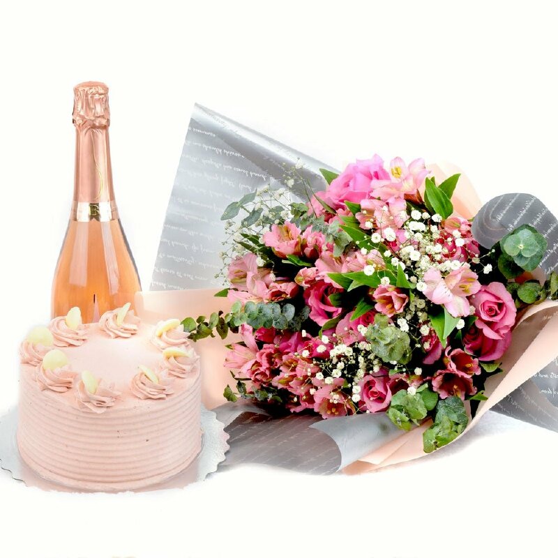 Hình hình ảnh cái bánh kem color hồng kèm cặp bó hoa và chai rựu chúc mừng sinh nhật