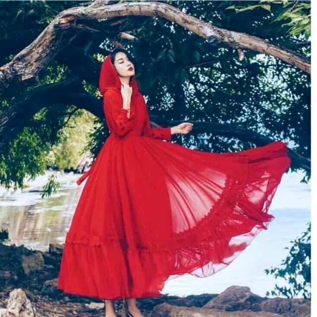 Cách tạo dáng chụp ảnh với váy maxi xoay người để tạo độ xòe của váy