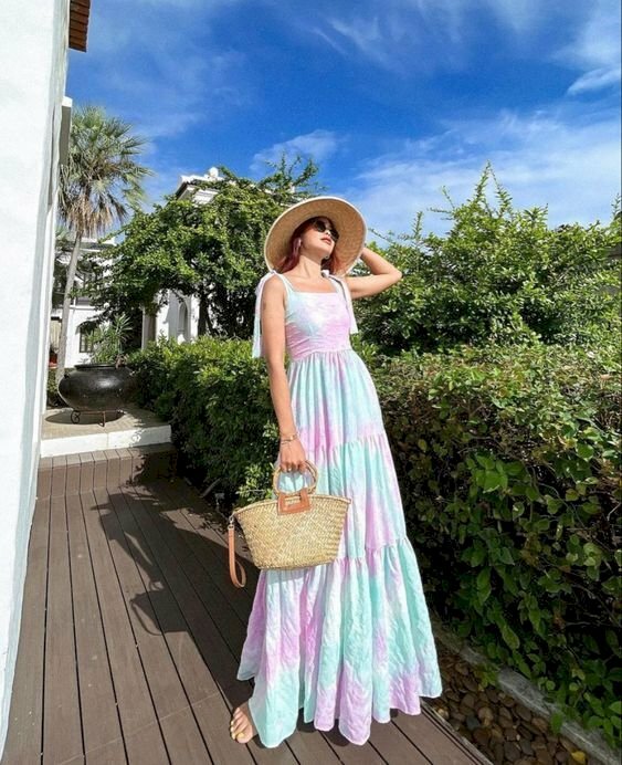 Cách tạo dáng chụp ảnh với váy maxi dáng nghiêng người giúp hack chân