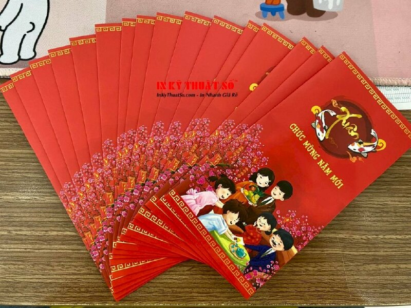 In bao lì xì cho con cháu trong gia tộc Nguyễn-Châu từ đường Tân An - In Kỹ Thuật Số Since 2006 - Ảnh: 5