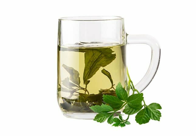 Ảnh ly trà làm từ lá cây giao cổ lam