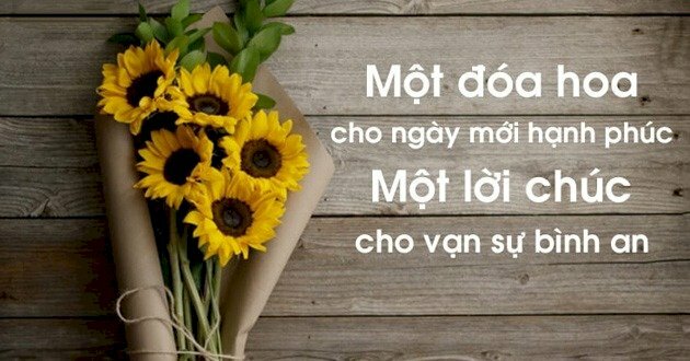Hình ảnh bó hoa hướng dương dễ thương và lời chúc ngày mới bình an, hạnh phúc