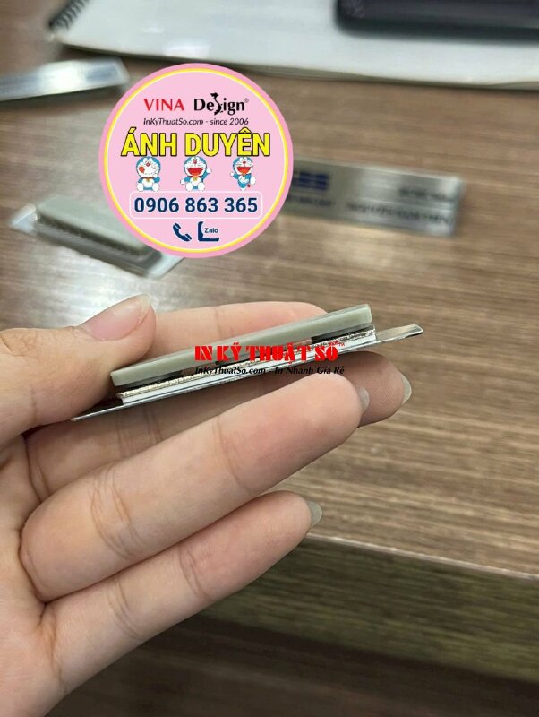 Làm bảng tên Inox xước khắc ăn mòn, chữ đổ màu, gắn nam châm mặt sau chức danh HCMC Sales cho nha khoa Implant - INKTS2051