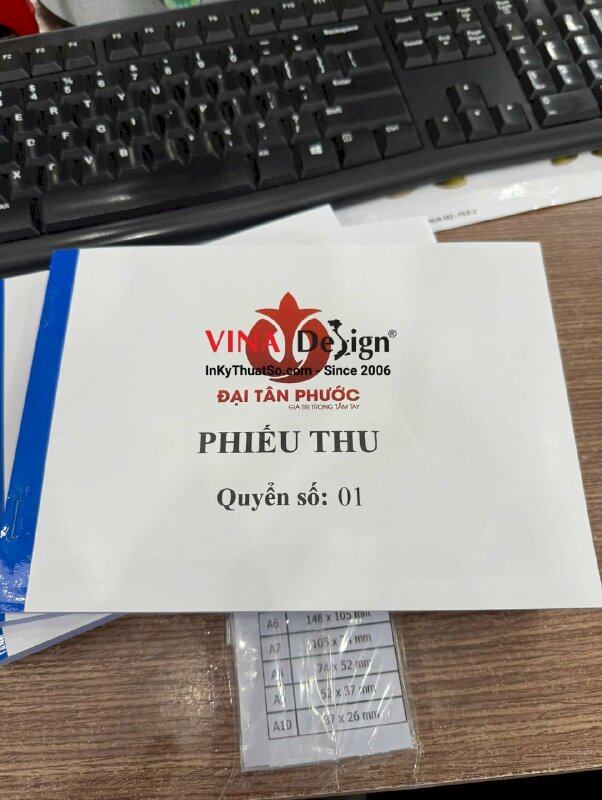 In phiếu thu tiền cọc cho công ty bất động sản, quyển biểu mẫu khổ A5 ngang, 3 liên - INKTS3441