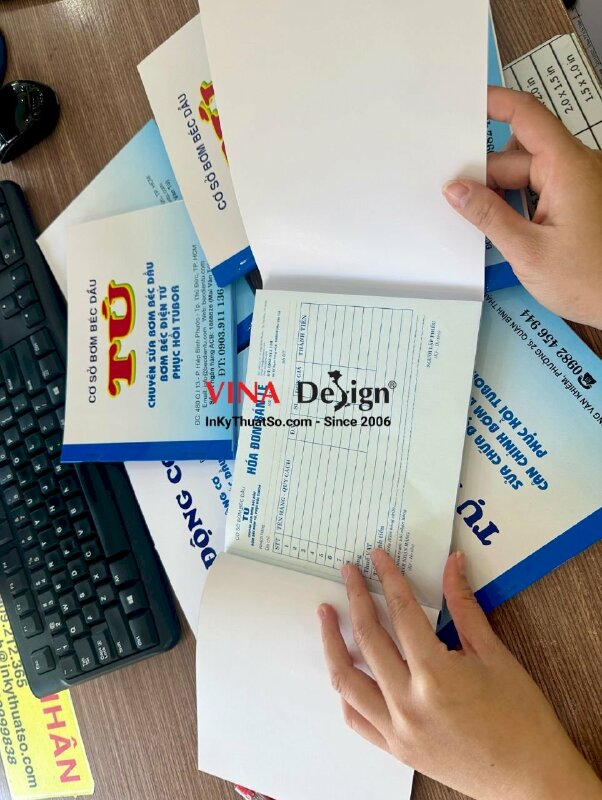 In hóa đơn bán lẻ 2 liên cho cơ sở bơm béc dầu, có in mặt bìa, có làm tay gấp lót lúc ghi hóa đơn - INKTS920