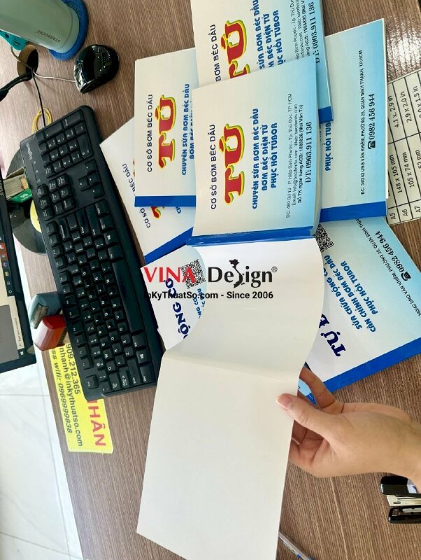 In hóa đơn bán lẻ 2 liên cho cơ sở bơm béc dầu, có in mặt bìa, có làm tay gấp lót lúc ghi hóa đơn - INKTS920