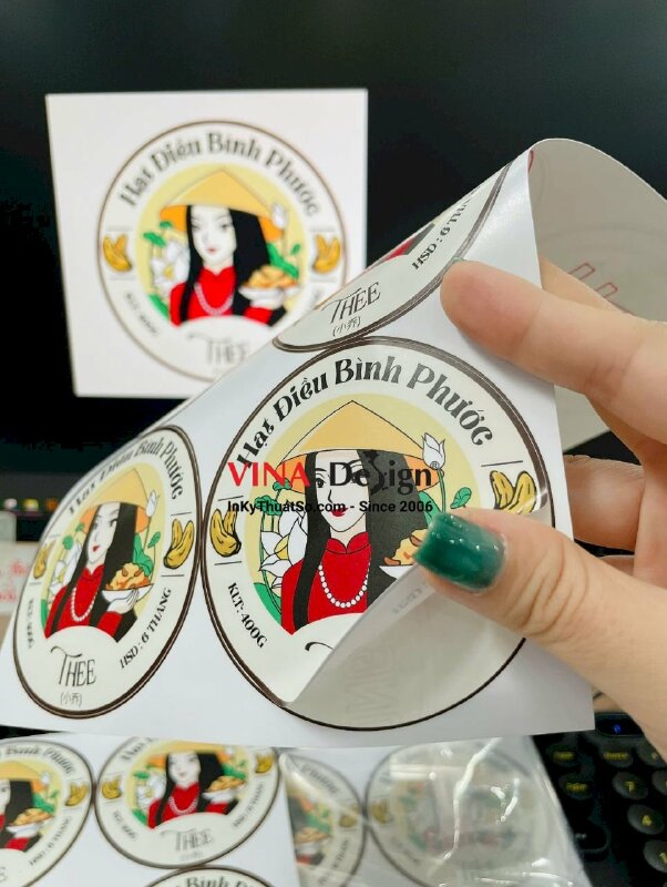In nhãn hạt điều Bình Phước dán hộp bao bì, tem Decal sữa in mực dầu, cán mờ, bế tròn - INKTS3490