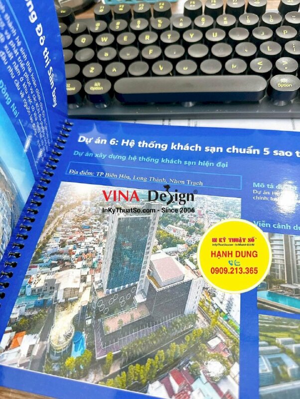 In quyển catalogue giới thiệu dự án bất động sản, gáy lò xo dễ lật mở - INKTS3482