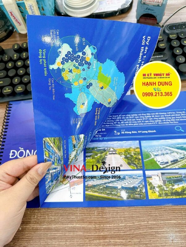 In quyển catalogue giới thiệu dự án bất động sản, gáy lò xo dễ lật mở - INKTS3482