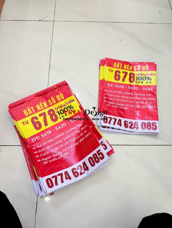 In băng rôn bán đất nền sổ đỏ kèm thông tin và số hotline môi giới bất động sản, in bạt hiflex xỏ cây trên dưới - INKTS2225