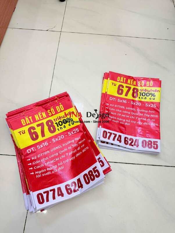 In băng rôn bán đất nền sổ đỏ kèm thông tin và số hotline môi giới bất động sản, in bạt hiflex xỏ cây trên dưới - INKTS2225