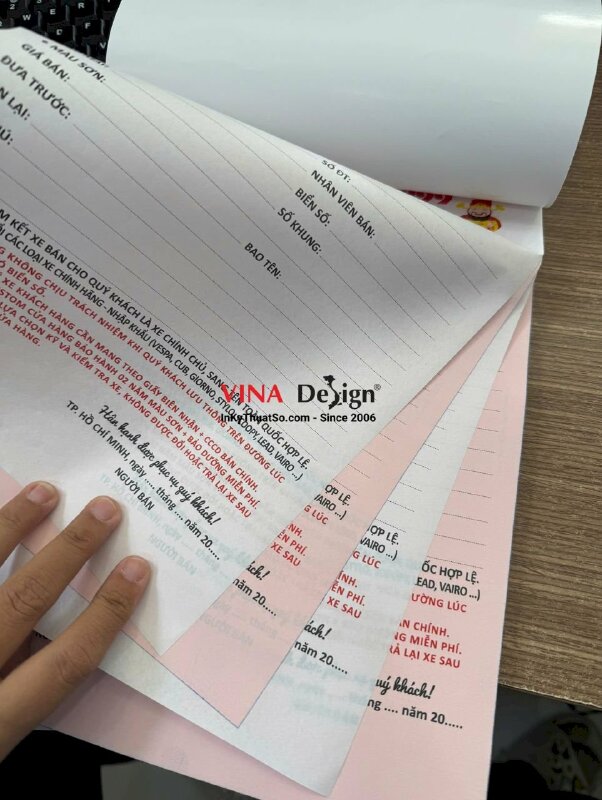 In biên nhận mua bán xe dạng quyển, cấn răng cưa, đánh số nhảy, biểu mẫu 2 liên trắng hồng giấy Carbonless - INKTS3757
