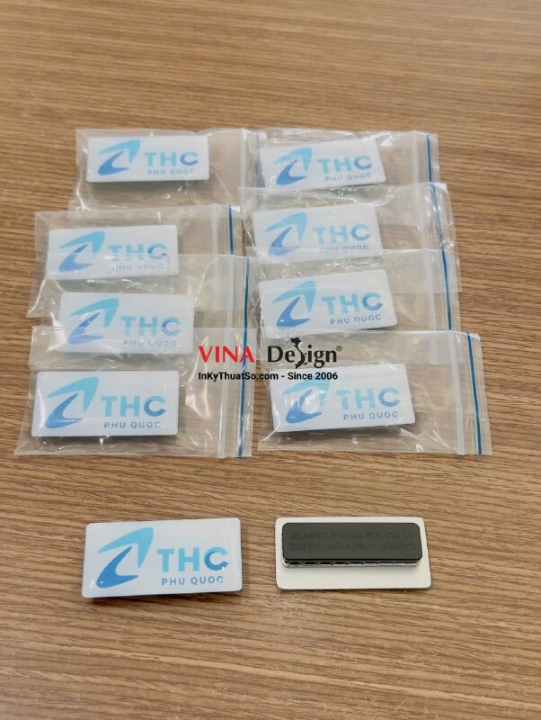 In huy hiệu cài áo logo công ty du lịch và tour trọn gói tại Phú Quốc, nhựa đổ keo gắn nam châm hít - INKTS3729
